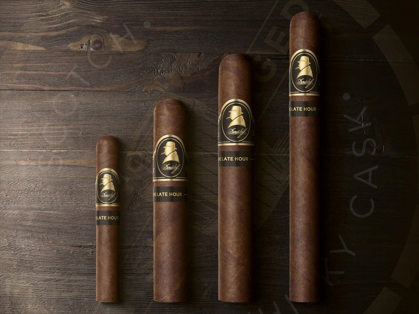 Davidoff Winston Churchill The Late Hour Series cigars on a dark wooden whisky cask